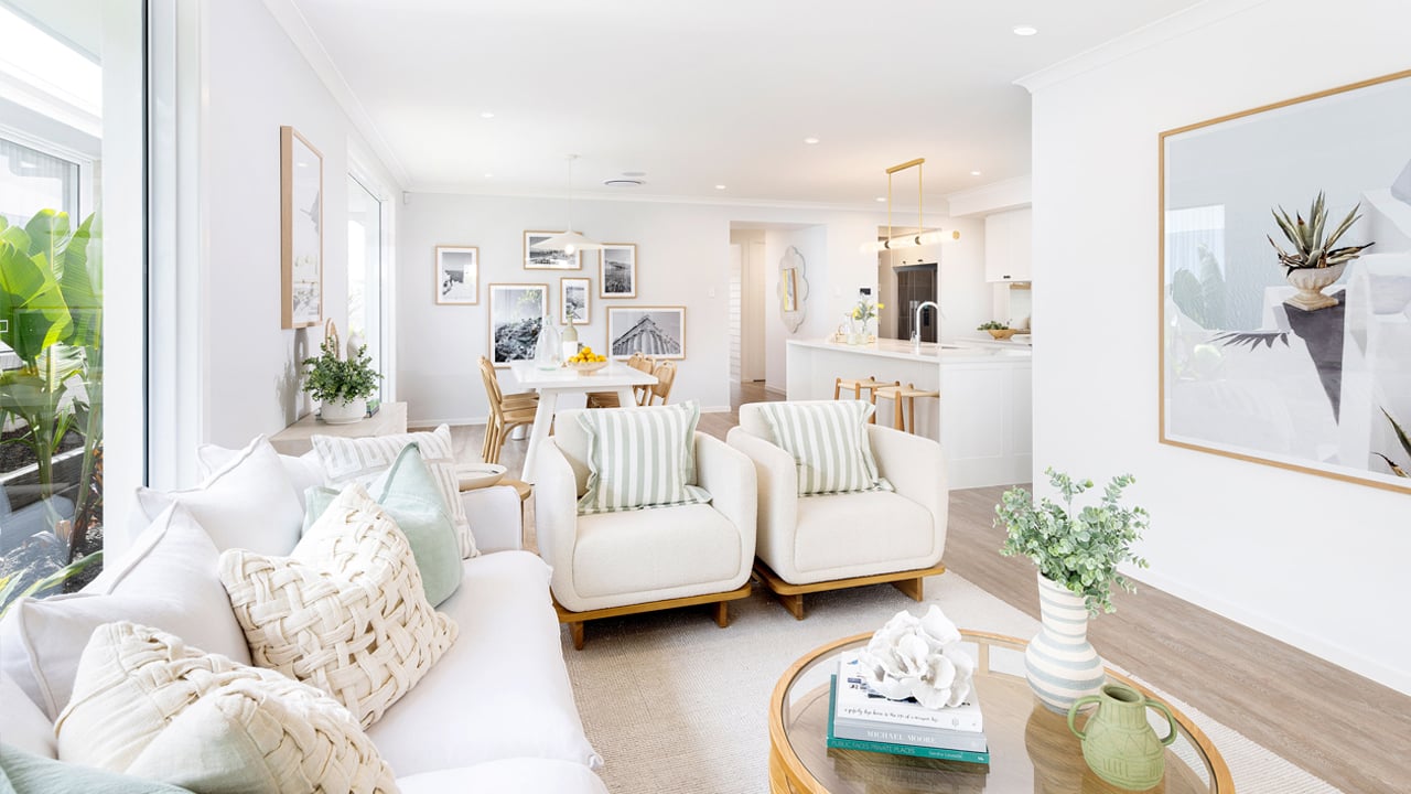 A bright, open-plan living and dining room in a modern Brisbane home