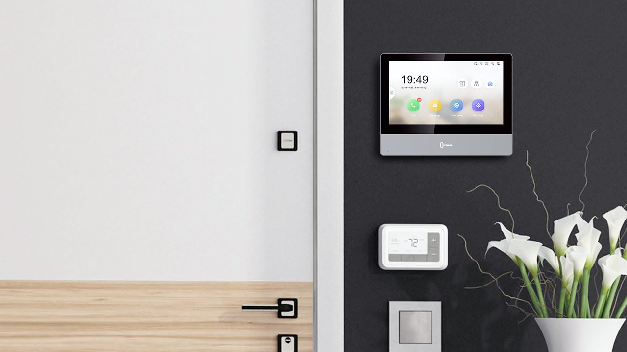 Intercom Indoor Monitor panel mounted on a wall in Brisbane, displaying automation options.