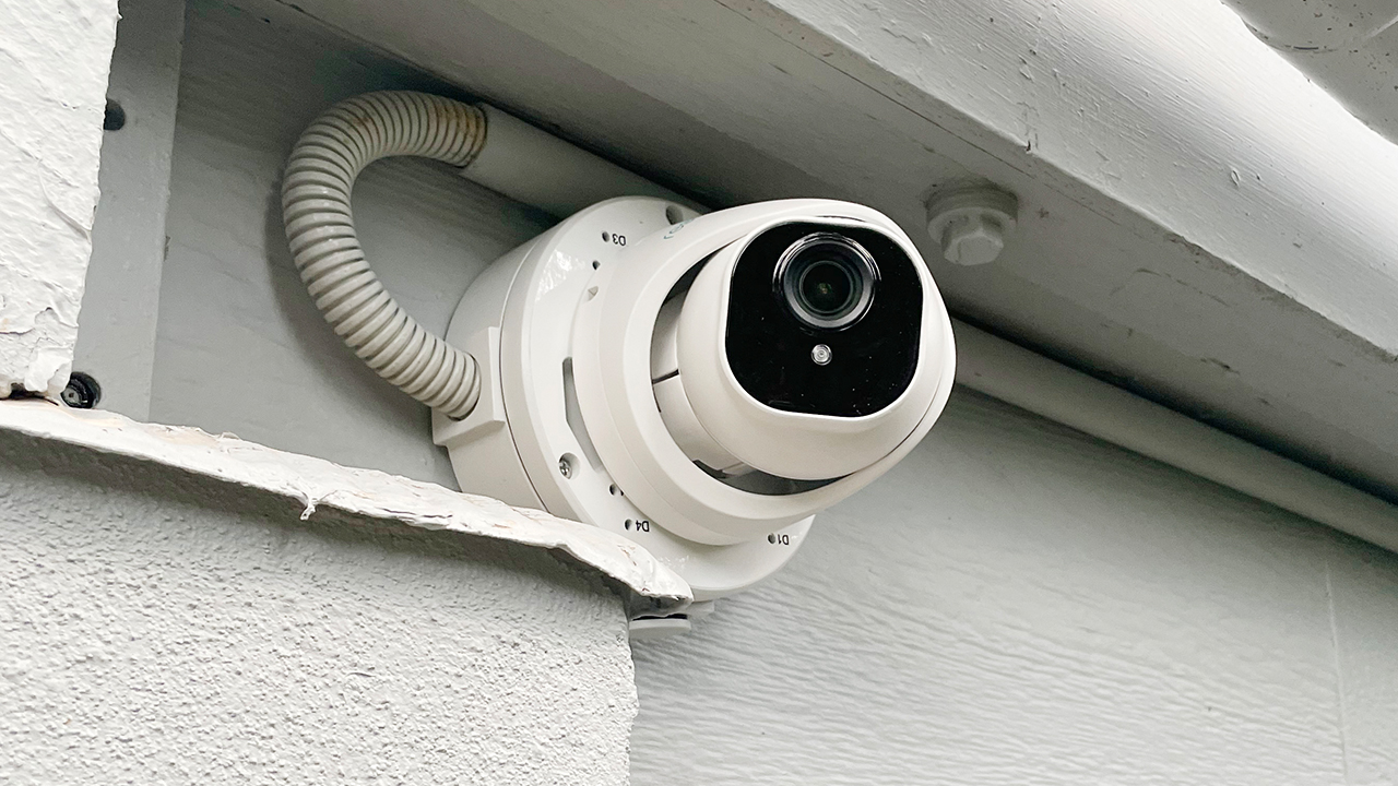 Reolink turret security camera mounted under eaves on the exterior of a Brisbane home.