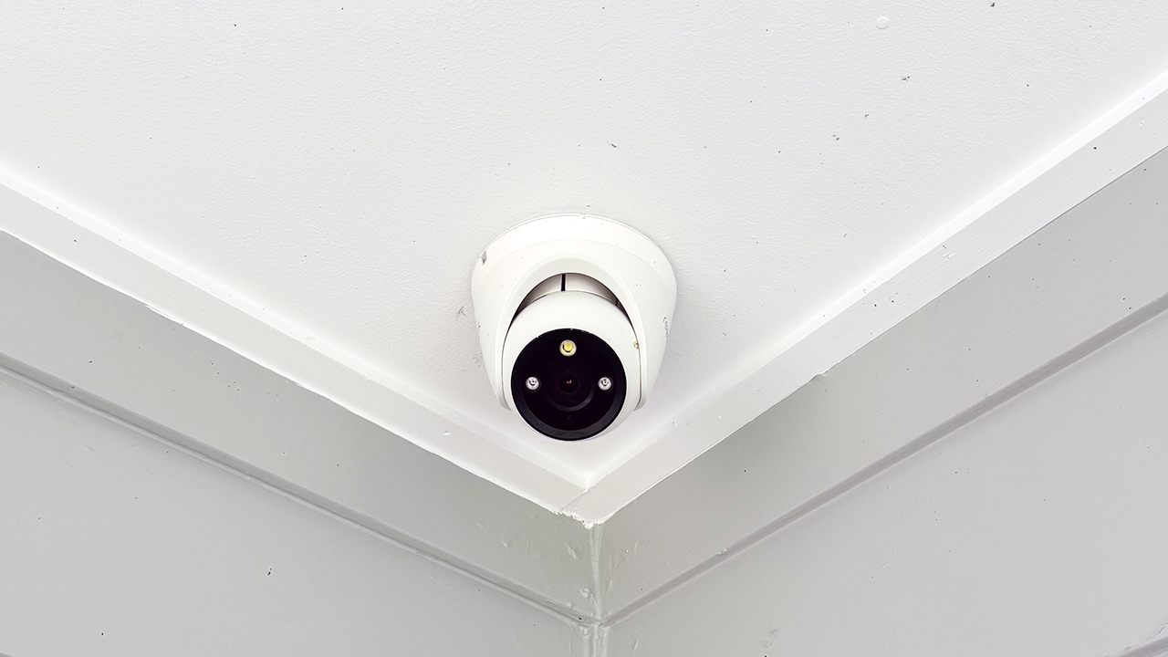 Reolink Turret Camera Installation in Brisbane & Gold Coast Reolink turret security camera installed under the eave of a brick house, providing discreet coverage and surveillance